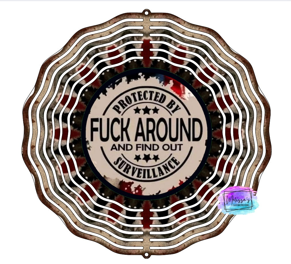 Protected By F*uck Around and Find Out Surveillance Wind Spinner